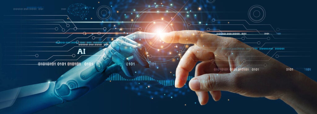 AI, Machine learning, Hands of robot and human touching on big data network connection background, Science and artificial intelligence technology, innovation and futuristic.