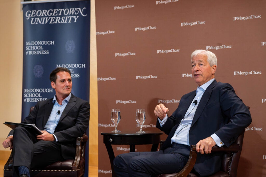 JPMorganChase CEO Jamie Dimon and Georgetown McDonough Professor Alberto Rossi on stage for a discussion AI and the Future of Work
